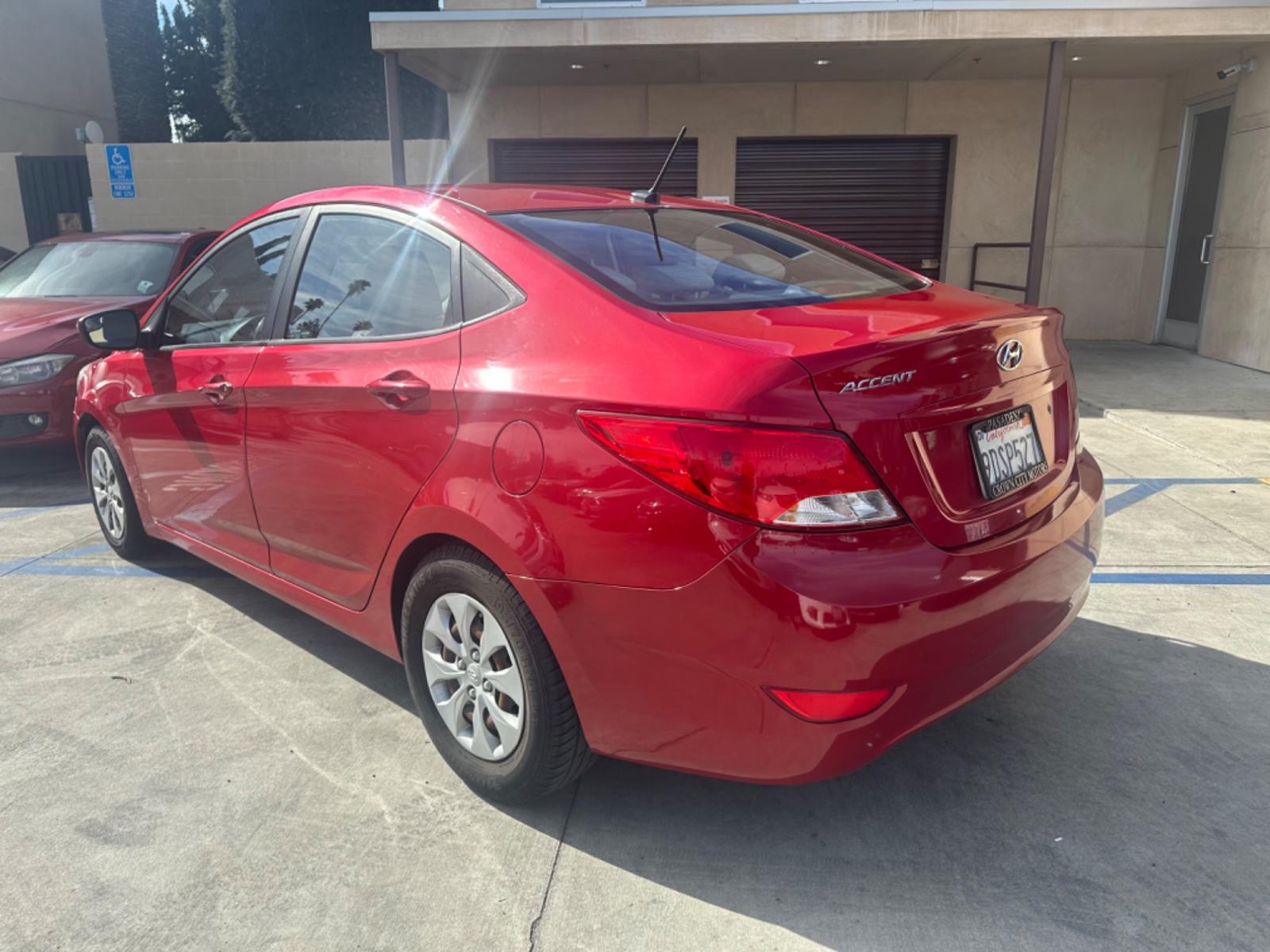 2015 Red /Gray Hyundai Accent GLS Sedan 4D (KMHCT4AE2FU) with an 4-Cyl, 1.6L engine, Auto, 6-Spd w/Overdrive transmission, located at 30 S. Berkeley Avenue, Pasadena, CA, 91107, (626) 248-7567, 34.145447, -118.109398 - Photo #3